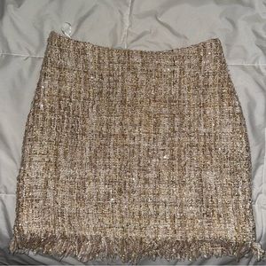 Sandy toned pencil skirt with gold. Little fringe and super beachy